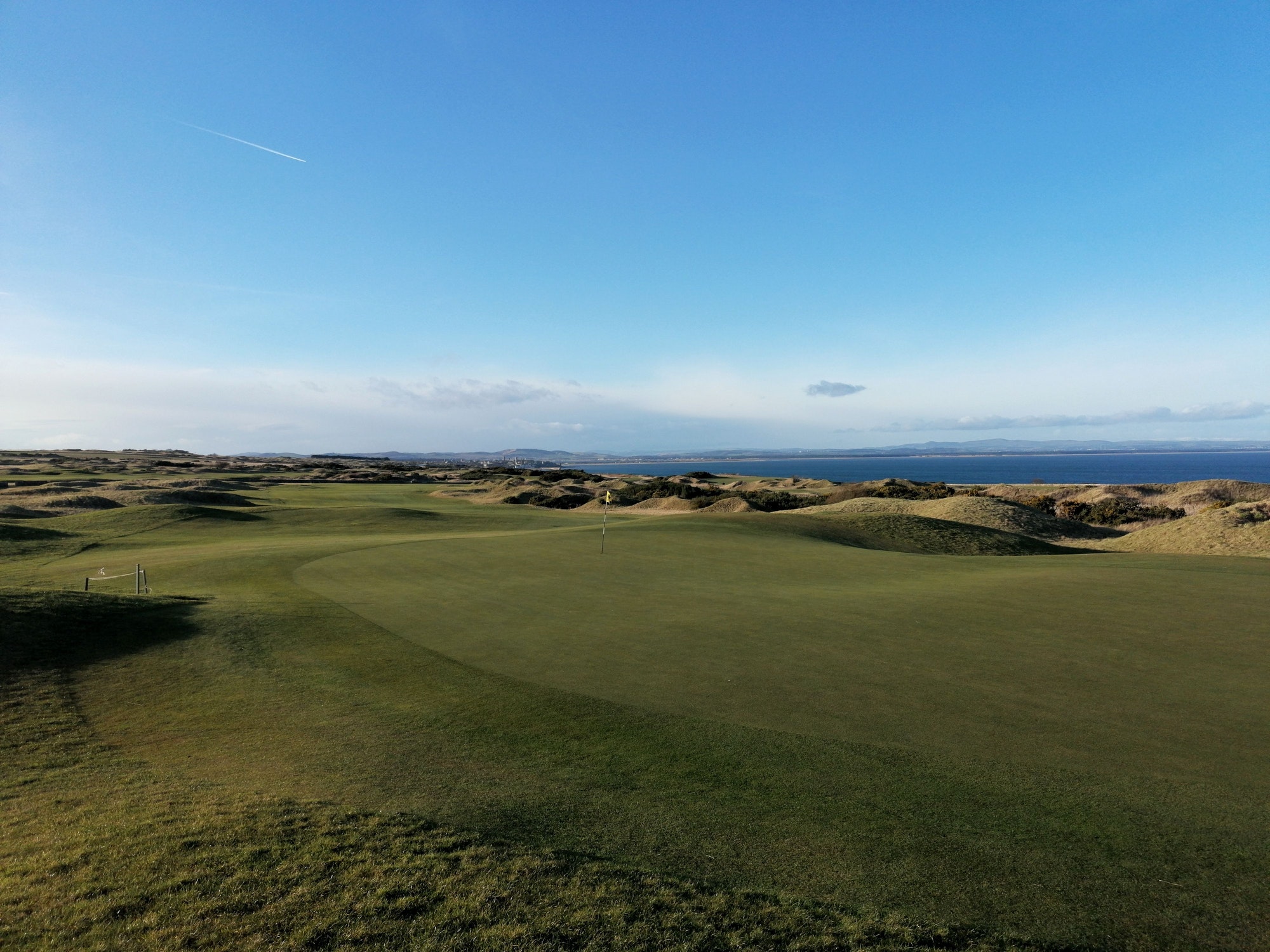 Aerial view of Fairmont St Andrews Torrance Course golf course, located in Scotland.